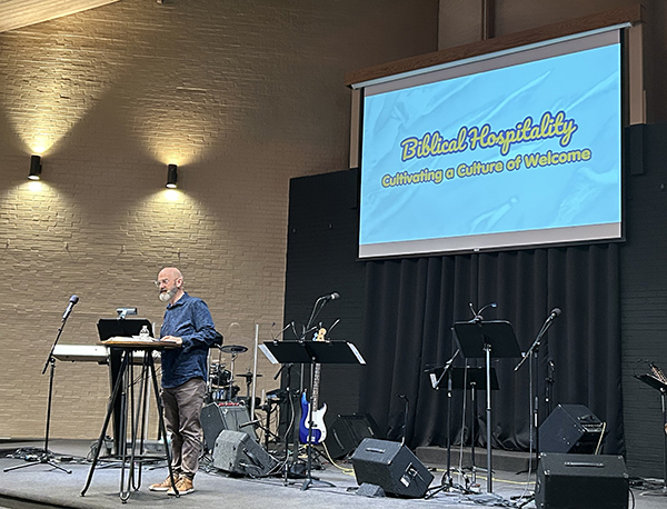 Mark sharing the Biblical Hospitality Workshop Training